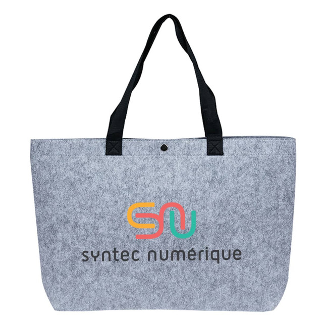 A grey felt tote bag with black handles, featuring a logo and colourful text.