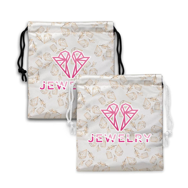 A small satin gift bag in white with a pattern of gifts and a logo in pink. Features drawstring closures.