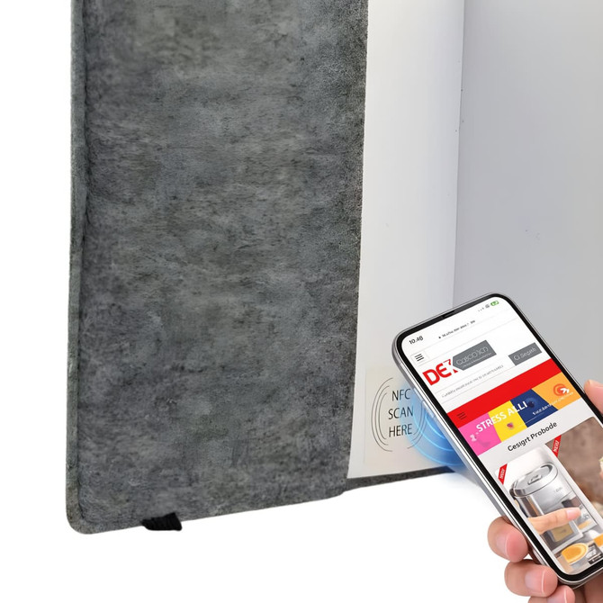 A grey felt notebook with a mobile phone displaying a website, featuring a sleek design and NFC capability.
