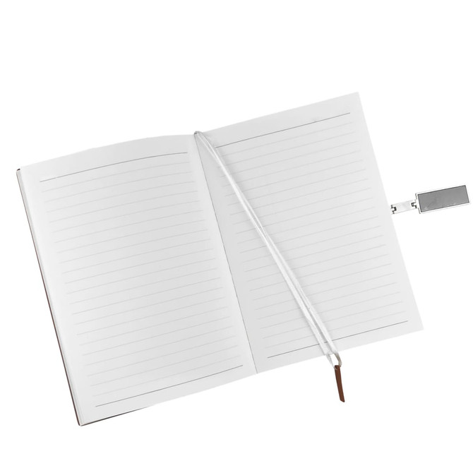A silver and white notebook with lined pages and a ribbon bookmark, featuring a logo on the cover.