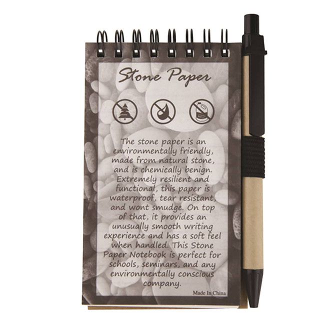 A Stone Paper Notebook with a black and natural coloured pen attached, featuring a spiral binding and environmentally friendly design.