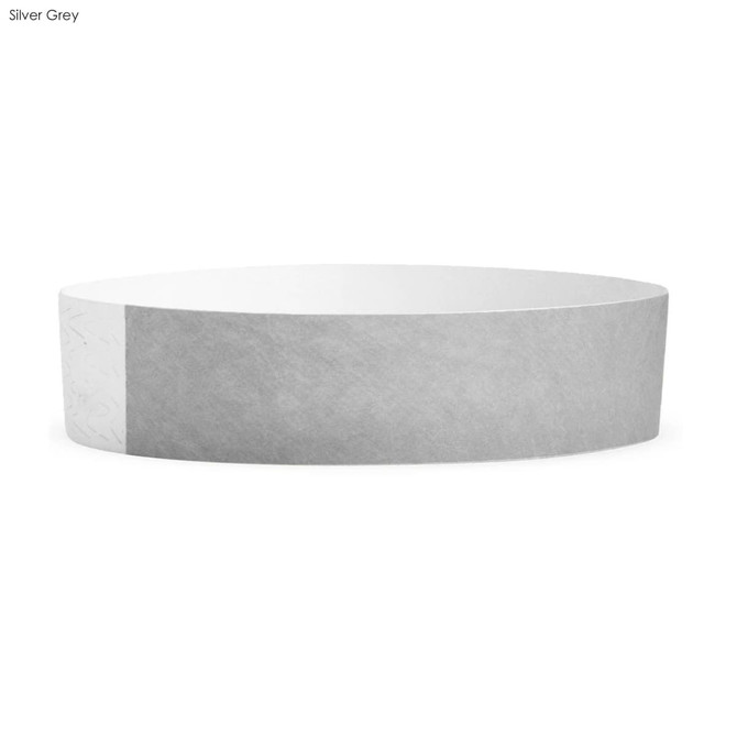 A silver grey Tyvek kids wristband, 19mm wide, with a smooth, textured design and a logo on one side.