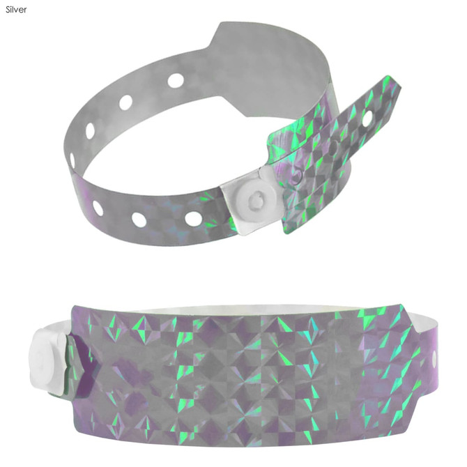 A holographic wristband in silver with a textured, shiny surface and adjustable snap closure.