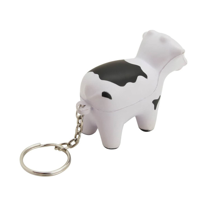 A stress keyring shaped like a black and white cow, attached to a silver chain.