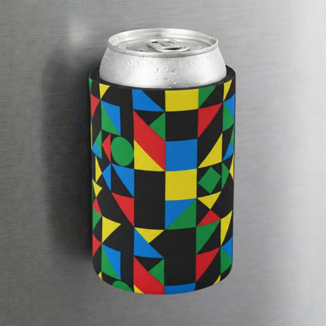 A drink can in a colourful magnetic stubby cooler with geometric patterns attached to a metal surface.