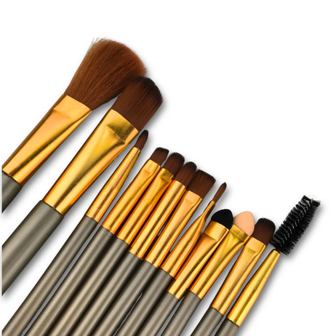 A set of twelve brushes with metallic gold and silver accents, arranged neatly in a row.