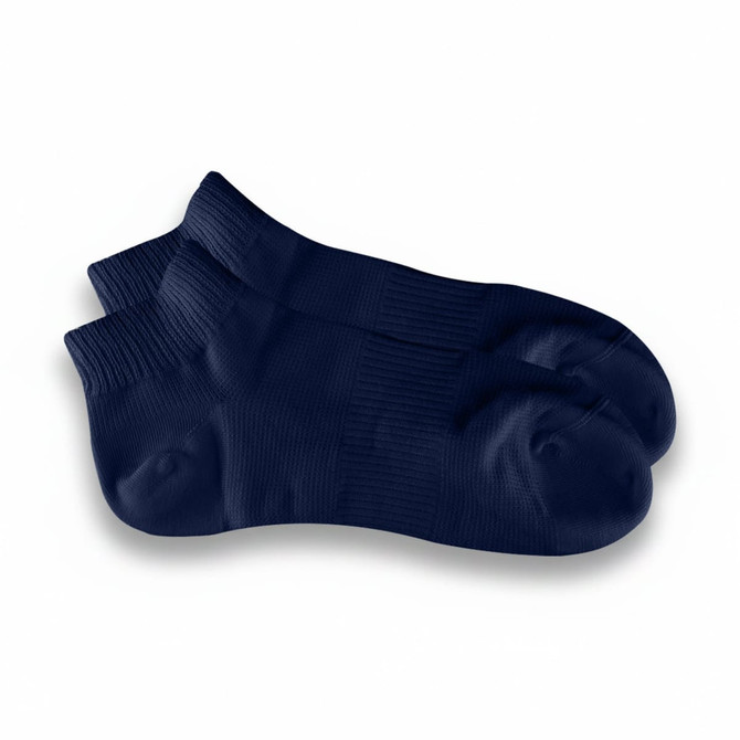 Ankle grip socks in navy blue, featuring a textured design and a logo on the side.