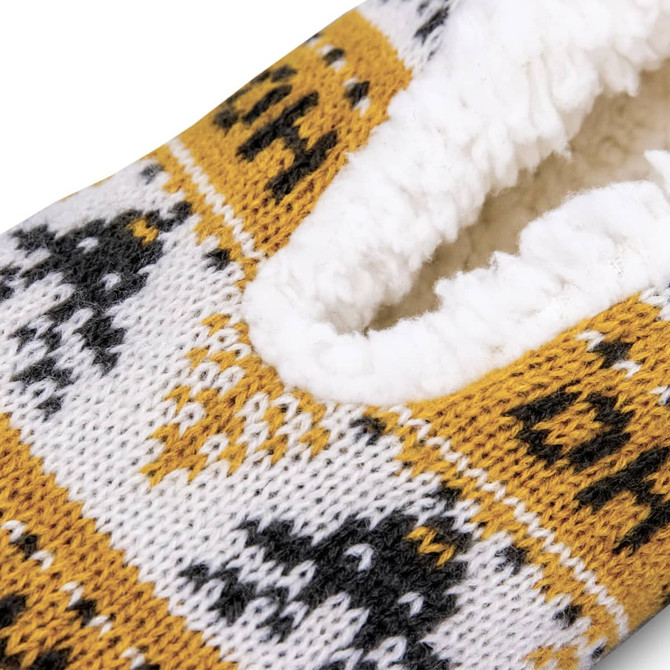 A pair of custom knitted slippers in yellow, white, and black with a soft inner lining and decorative pattern.