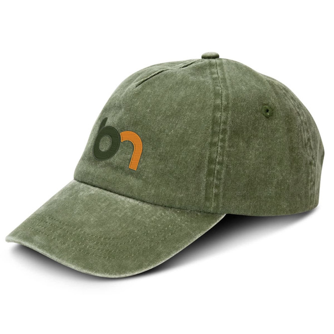 A vintage washed cap in olive green with an embroidered logo on the front.