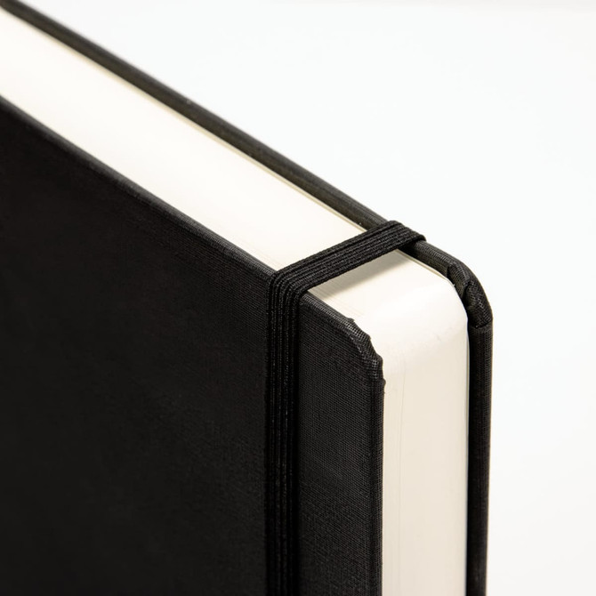 A5 daily diary in black, featuring a flexible cover and an elastic strap closure.