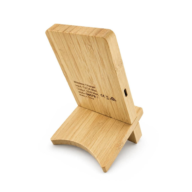 A bamboo charging stand with a curved base and a slot for a device. It has a small port on the side.