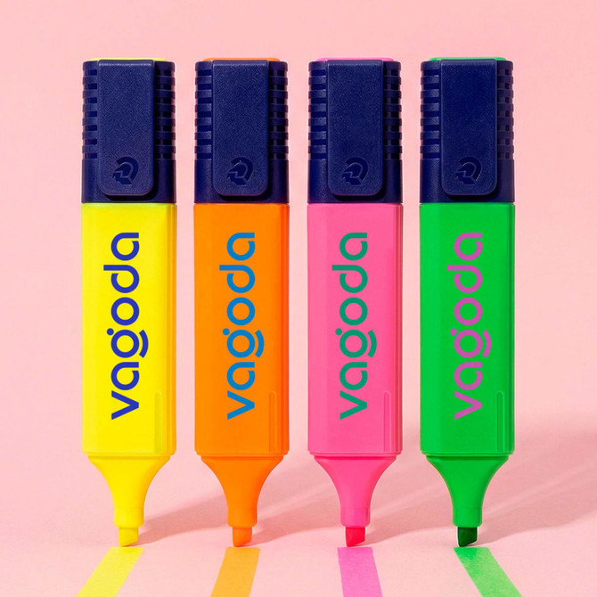 Four highlighters in vibrant colours: yellow, orange, pink, and green, each with a logo on the cap.