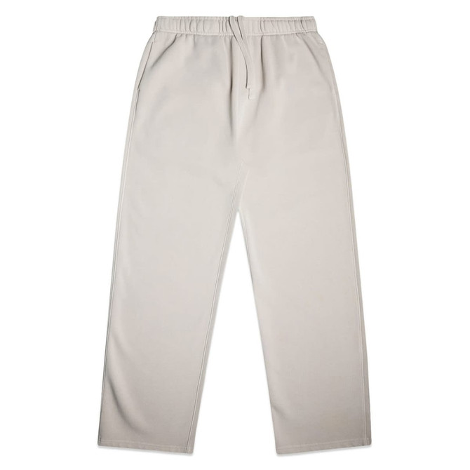 Cuffless track pants in a light beige colour, featuring an elasticated waistband and side pockets.
