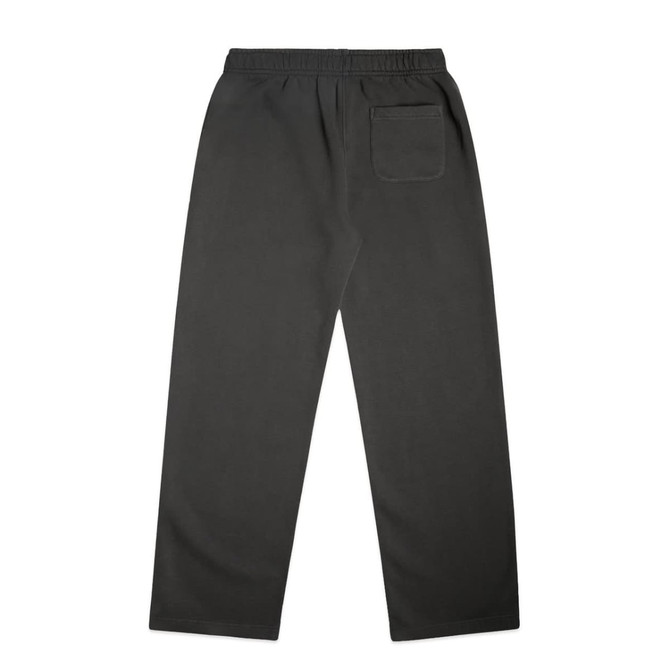 Cuffless track pants in dark grey with a back pocket and an elastic waistband. Features branding on the fabric.