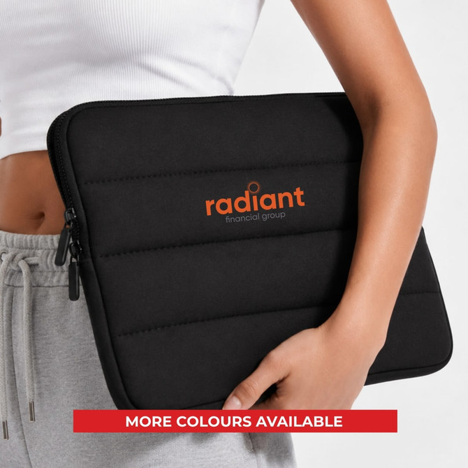 A black neoprene laptop sleeve with a padded design and a logo on the front, being held by a person.