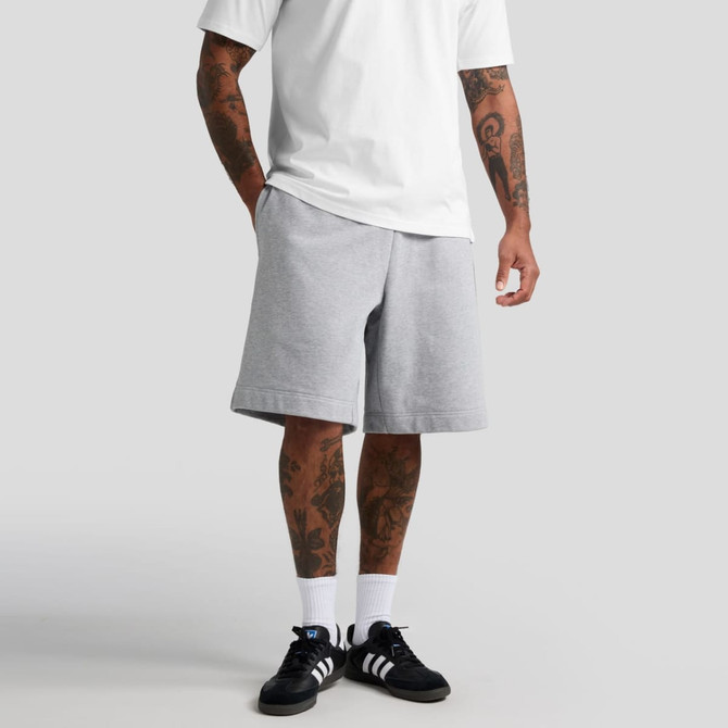 Light grey shorts with a relaxed fit, featuring an elastic waistband and side pockets, worn with a white t-shirt.