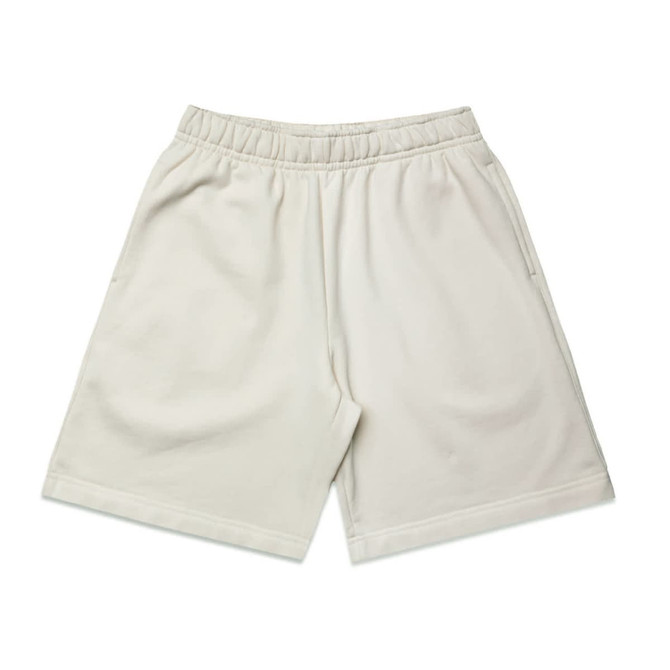 Light cream shorts with an elastic waistband and side pockets, featuring a simple design and no visible branding.
