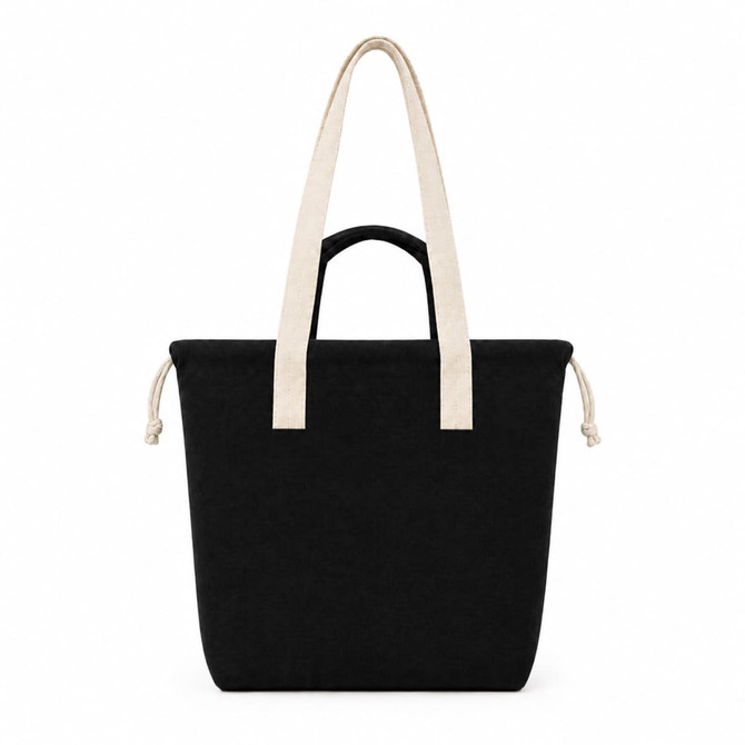 A black tote bag with cream handles and a drawstring closure, featuring branding on the front.