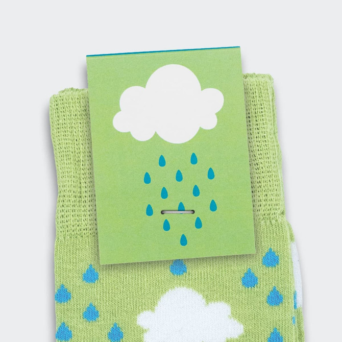A pair of green knitted business socks featuring a cloud and raindrop pattern, with a branded tag above.
