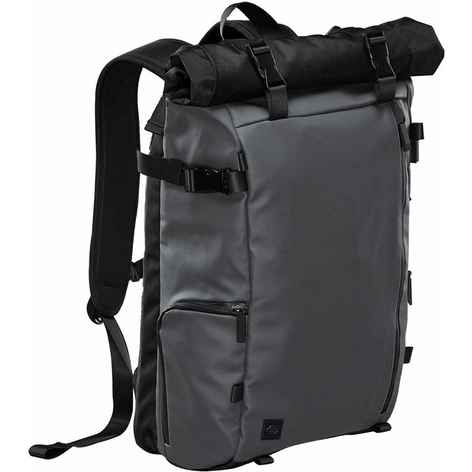 A roll top backpack in grey with black accents, featuring adjustable straps and a side zip pocket. It has a logo.