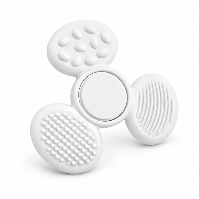 A white tactile fidget spinner with multiple textured surfaces and a central spinning mechanism.