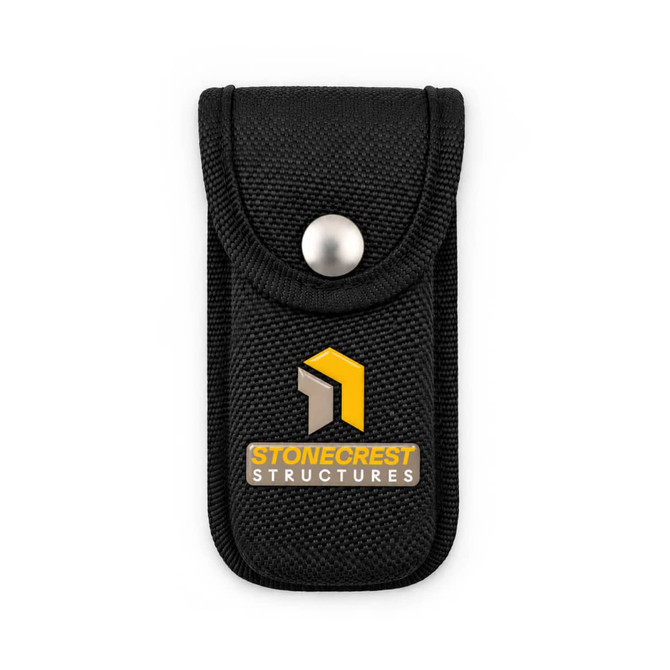 A black fabric pouch with a snap closure and a logo. It features a textured surface and a compact design.