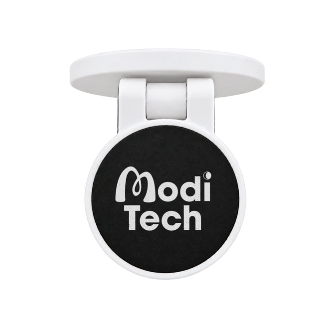 A round phone holder in white with a black gripping surface and a logo on it.