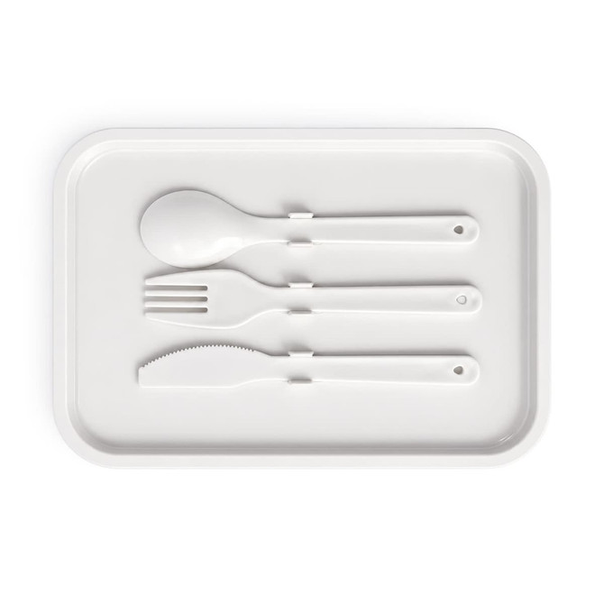 A white tray with an integrated spoon, fork, and knife, all in matching colour. The tray includes an embossed logo.