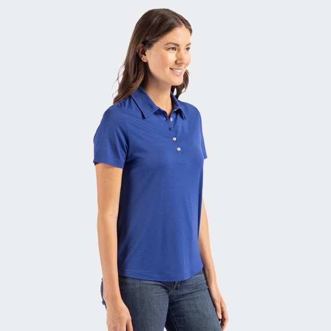 A blue women's polo shirt with a collar and short sleeves, featuring a logo.
