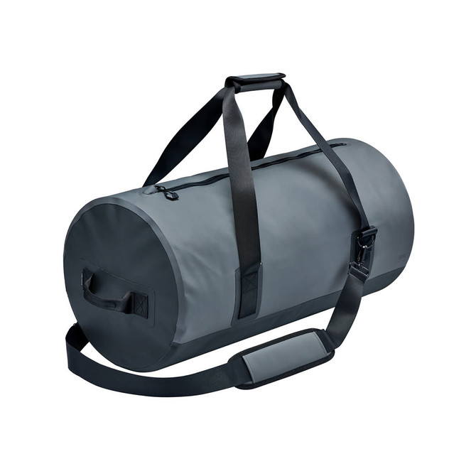 A grey waterproof duffel bag with a shoulder strap and handles, featuring a logo.