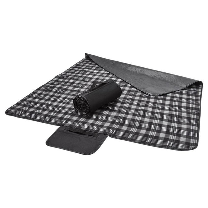 A picnic blanket featuring a black and white plaid design, rolled up with a black backing and a logo.