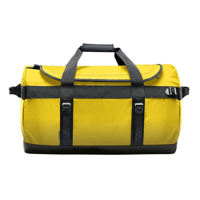 A large yellow waterproof gear bag with black straps and buckles. It features a durable design and a logo.