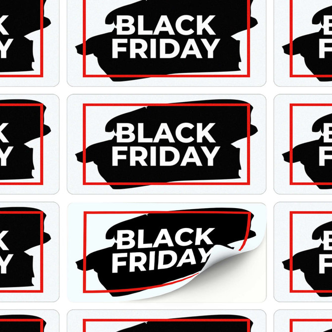A collection of rectangular black and white stickers with a red border, featuring the phrase "Black Friday."