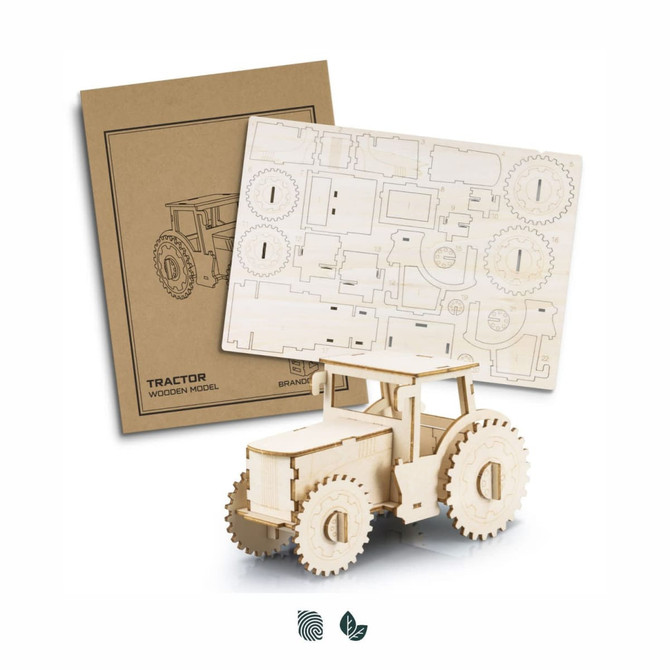 A wooden tractor model in natural colour, with assembly parts displayed on a cardboard backing.