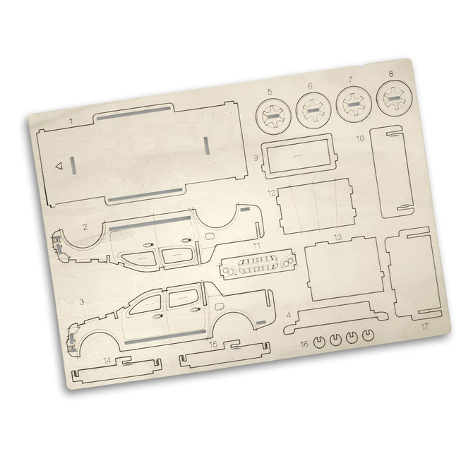 A wooden model kit featuring laser-cut parts of a UTE in a light natural wood colour, with various vehicle elements.