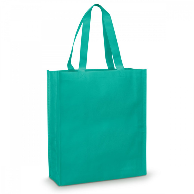 A turquoise tote bag with sturdy handles and a simple design. It has a branding logo on one side.