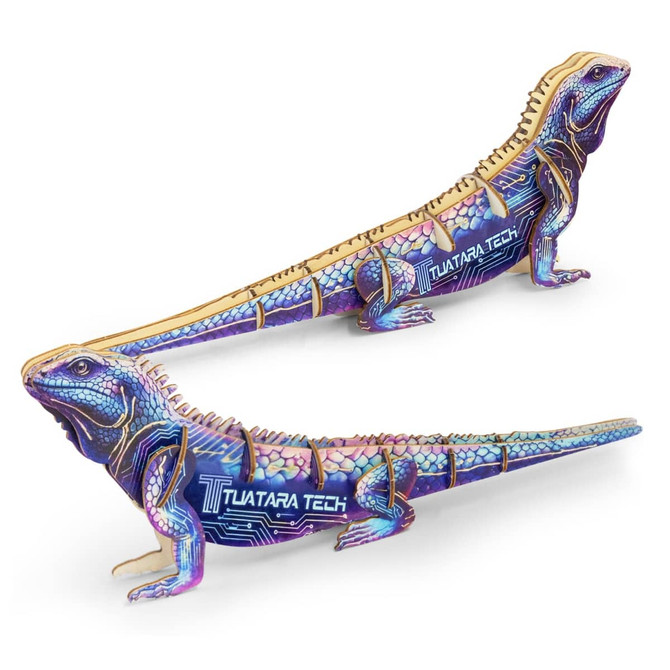 A wooden model of a tuatara lizard in vibrant blue and purple, featuring a detailed design and branding.