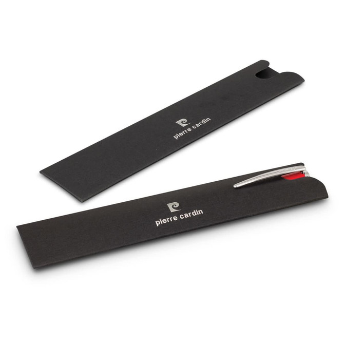 A metal pen in a sleek black presentation box, featuring a shiny silver clip and red accents. The box has a logo.