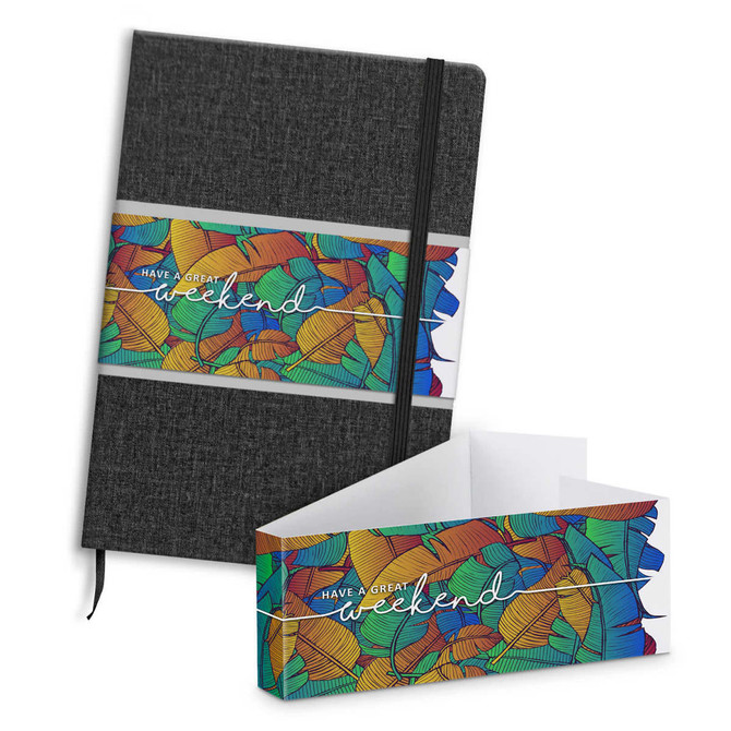 A black notebook with an elastic band and a colourful decorative box featuring a leaf design.