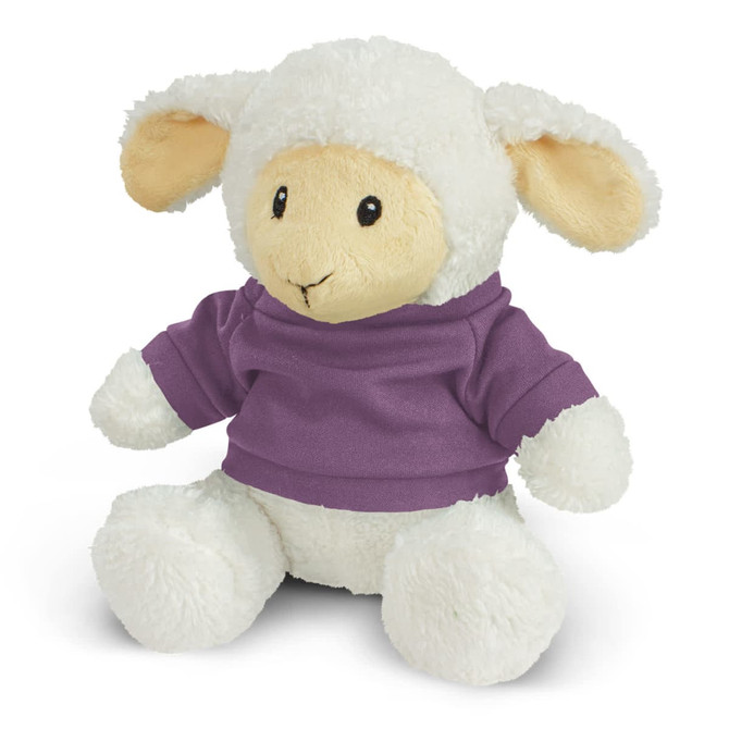 A soft lamb plush toy with cream fur, wearing a purple shirt and cute floppy ears. It has a friendly expression.