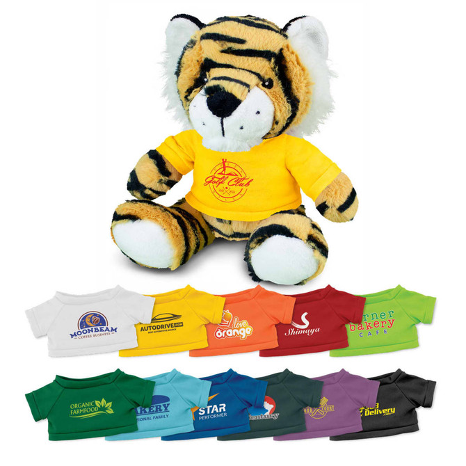 A plush tiger toy wearing a yellow shirt, surrounded by various miniature shirts in different colours.