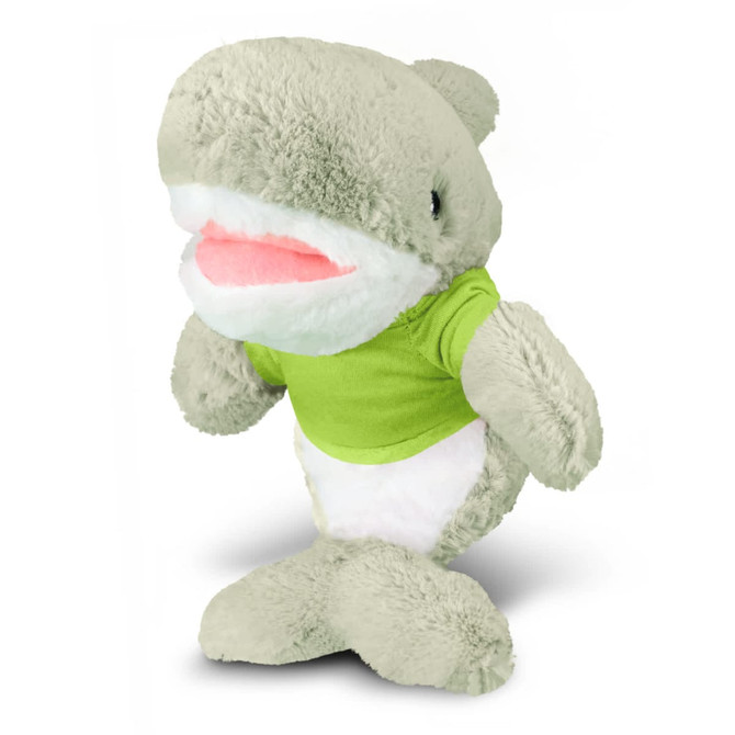 A soft grey and white shark plush toy wearing a green T-shirt, standing upright with a cheerful expression.