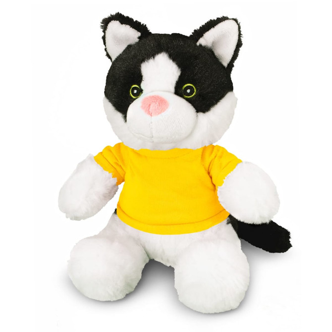 A black and white cat plush toy wearing a yellow t-shirt, featuring large green eyes and soft fur.