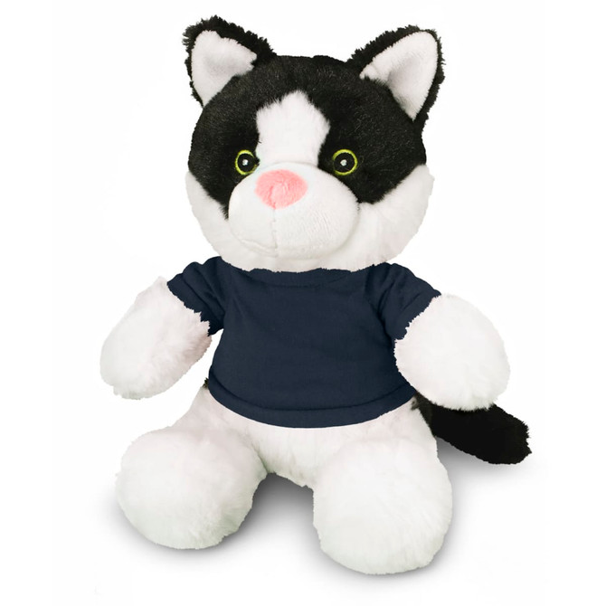 A black and white cat plush toy wearing a navy blue shirt, featuring bright green eyes and a pink nose.