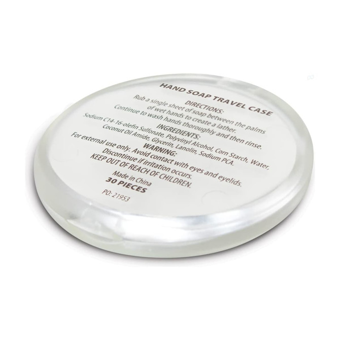 A round, clear travel case containing hand soap, with ingredients listed on the underside.
