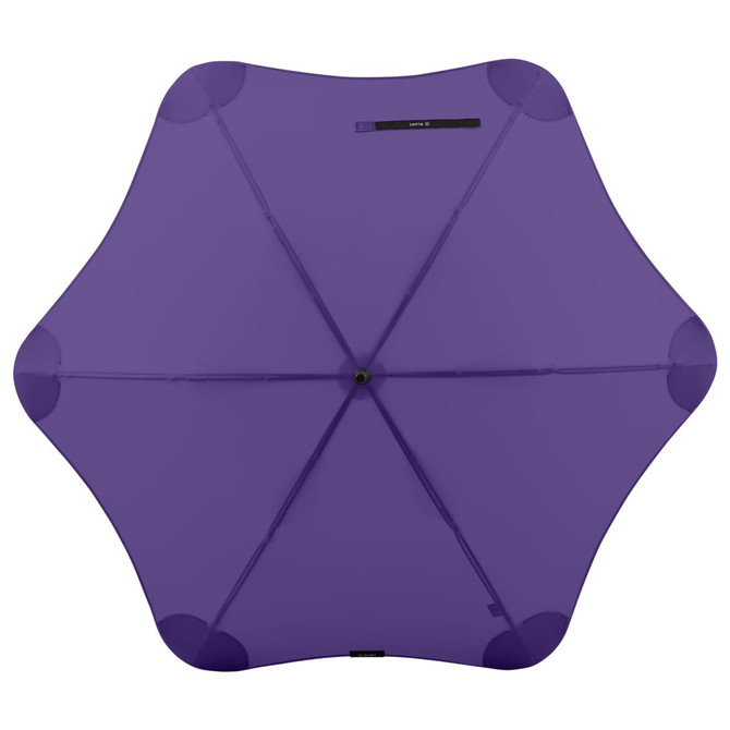 A purple umbrella with a star-shaped design and a central opening, featuring a logo on the top.