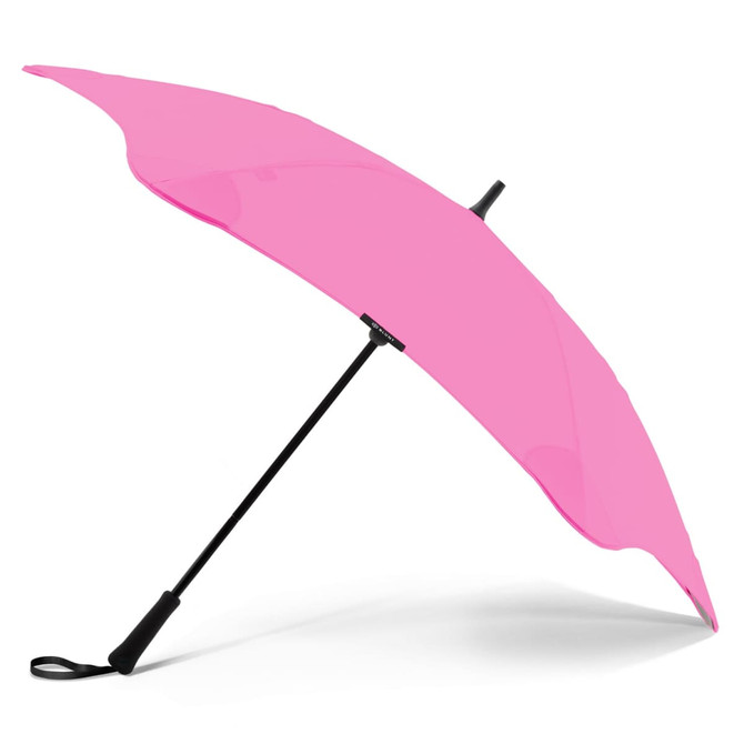 A pink umbrella with a black handle and frame, designed for leisure and outdoor use.