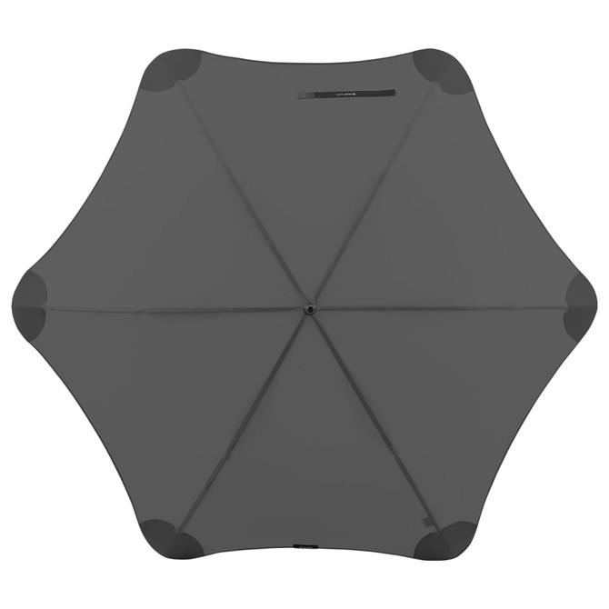 A dark grey umbrella with a unique hexagonal shape, featuring rounded corners and a central handle.