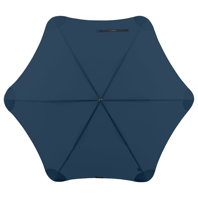 A dark blue umbrella with a unique hexagonal shape and a central opening. It includes a branding logo.