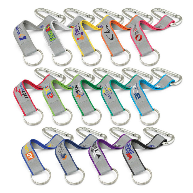 A collection of multi-coloured reflector key rings with metal carabiners, featuring various logos on the straps.